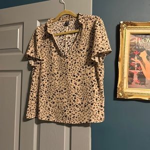 Brown short-sleeved blouse with black floral. SHEIN size large